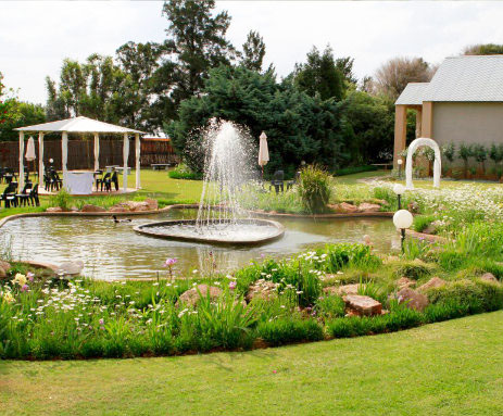 picturesque garden with fountain